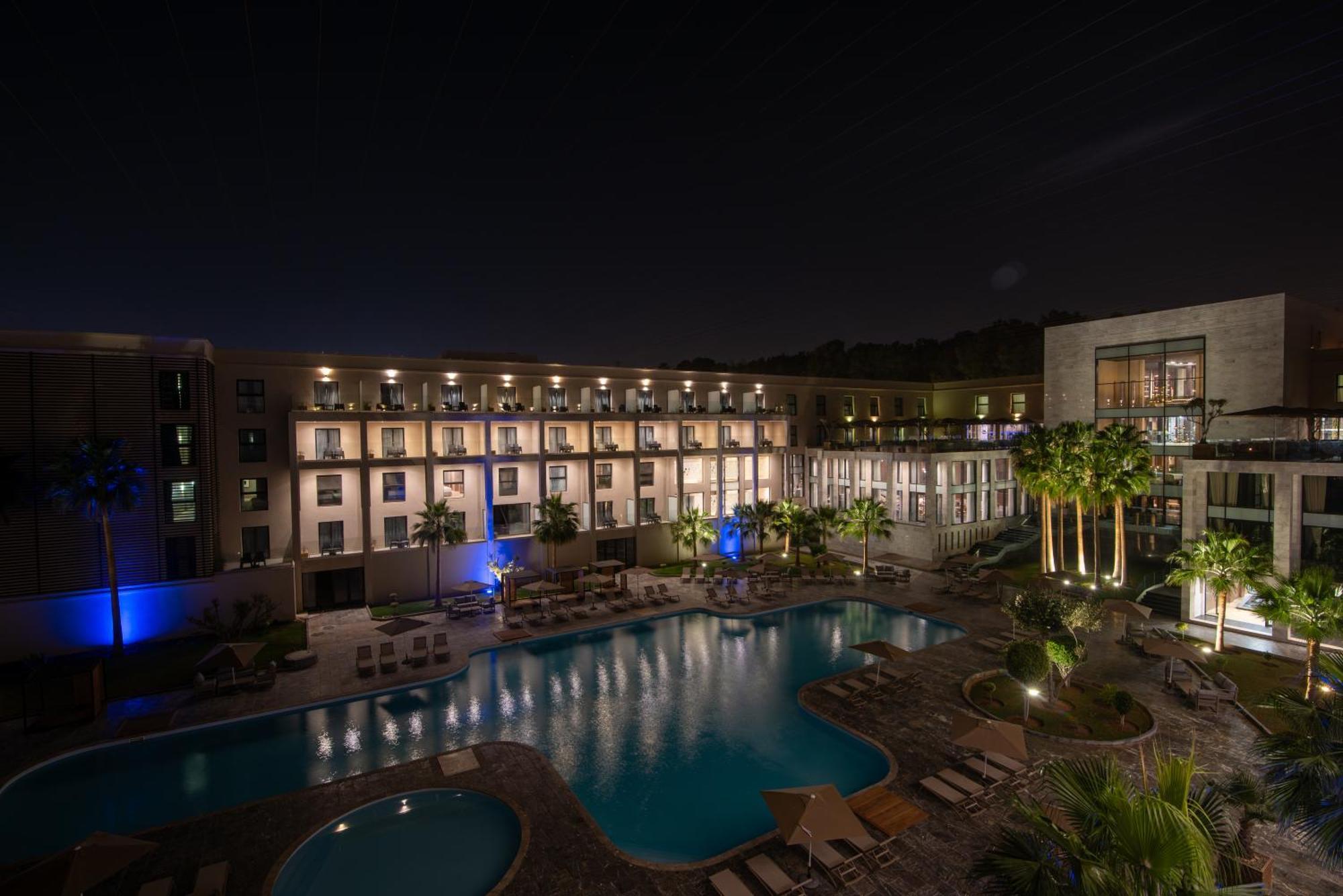 Dominium Palace Agadir Exterior photo The hotel at night